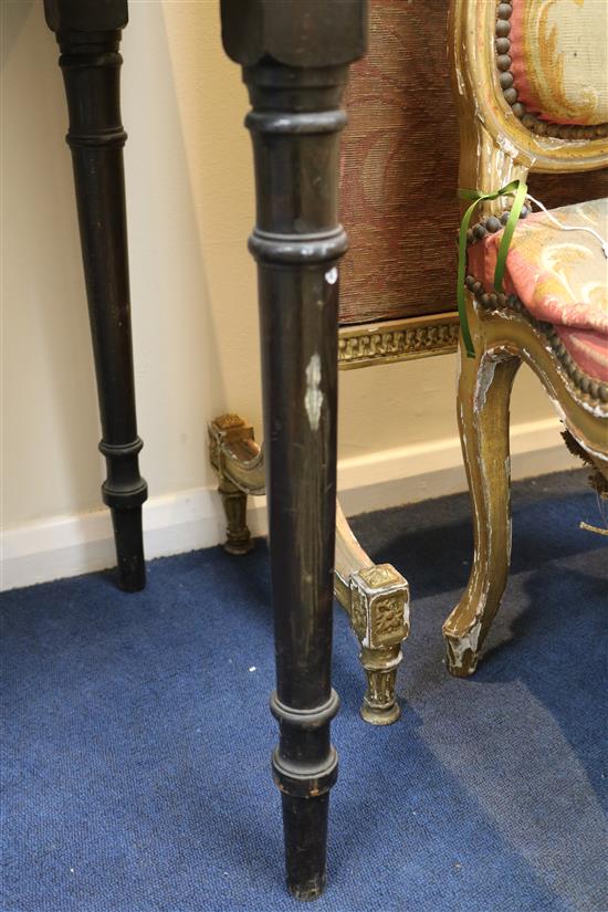 A Heal & Sons pine top ebonised side table 3ft 6in.